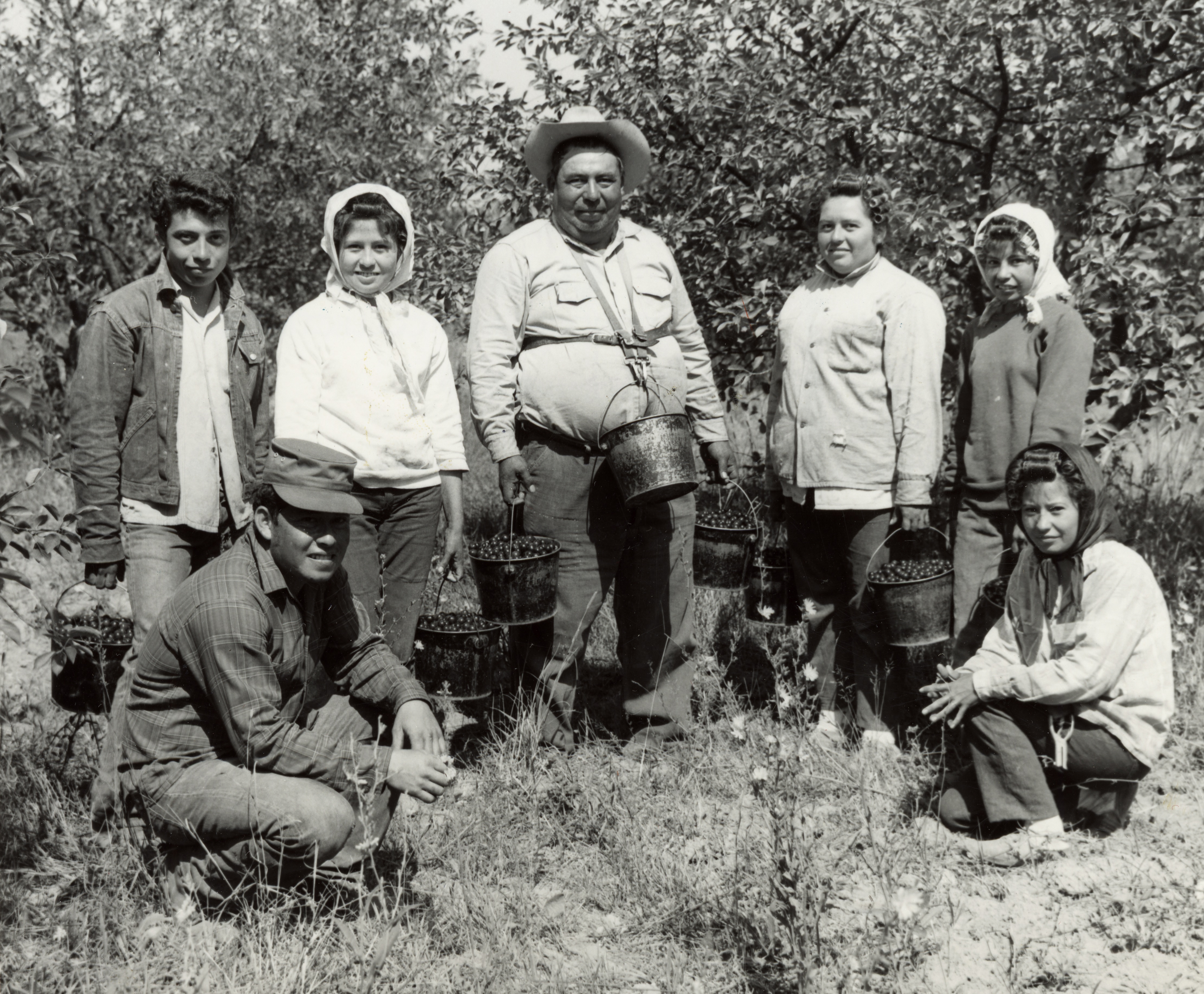 A migrant worker family in a Door County cherry orchard. Image courtesy of the Wisconsin Historical Society. Image ID: 48938.