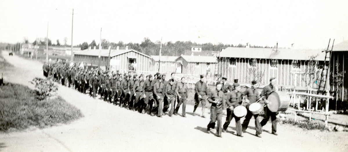 CCC Camp 657 recruits marching from Summit Lake to their new barracks at Elcho, WI, 1933. Photograph courtesy of the Langlade County Historical Society.