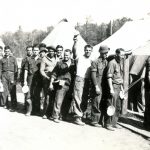 Civilian Conservation Corps recruits in line for the mess hall at Camp 657’s temporary location near Summit Lake, Wisconsin, c. 1933. Photograph courtesy of the Langlade County Historical Society.