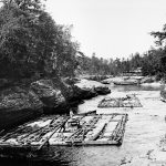 Lumber rafts on the Wisconsin River near the Wisconsin Dells, c. 1886. Photograph by H.H. Bennett, courtesy of the Wisconsin Historical Society, Image ID 6314.