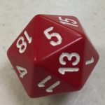A color photo of a red twenty-sided die