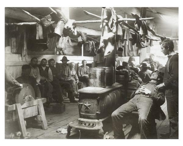 lumberjacks relaxing on a sunday morning in the bunkhouse