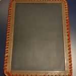 image of a slate tablet with bound edges