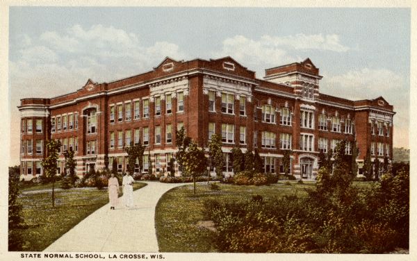 a color postcard showing a newly built brick building with students walking in front
