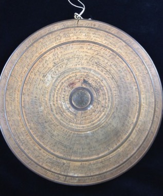 Back of Norwegian plaque with genealogy of Magelssen family written in concentric circles