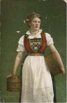 A Norwegian girl in traditional dress holding a basket
