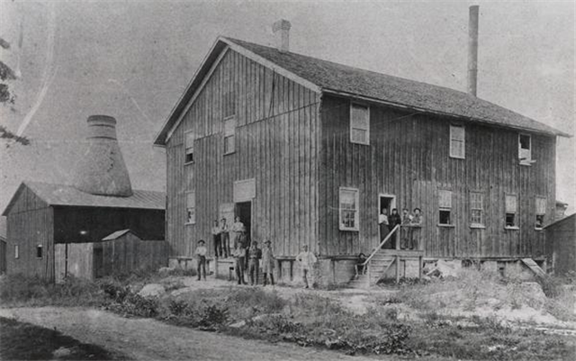 Pauline Pottery Building from 1890s. Pictured is the building and six kilns. 