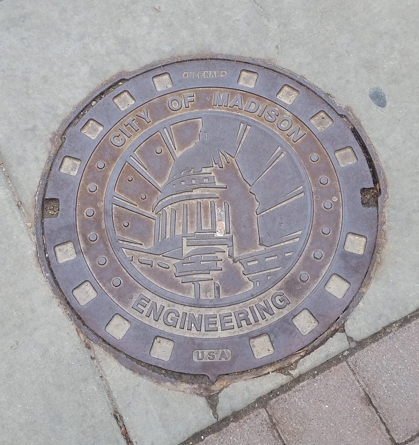 Read more about the article OBJECT HISTORY: Neenah Foundry Manhole Cover