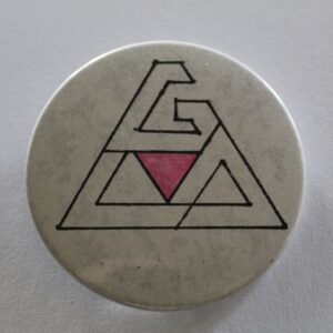 An original pin made by the members of GLO and donated by Carla Johnson representing their club with a pink triangle, a long symbol of gay liberation. 

Source: GLO pin, The University of Wisconsin–Eau Claire Gay and Lesbian Oral History Project.
