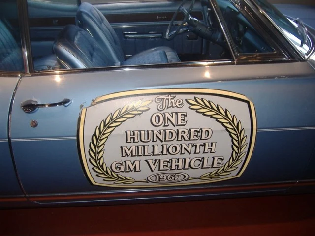 The sticker affixed to the passenger-side door designates this as the 100,000,000 vehicle. Photo from www.curbsideclassic.com