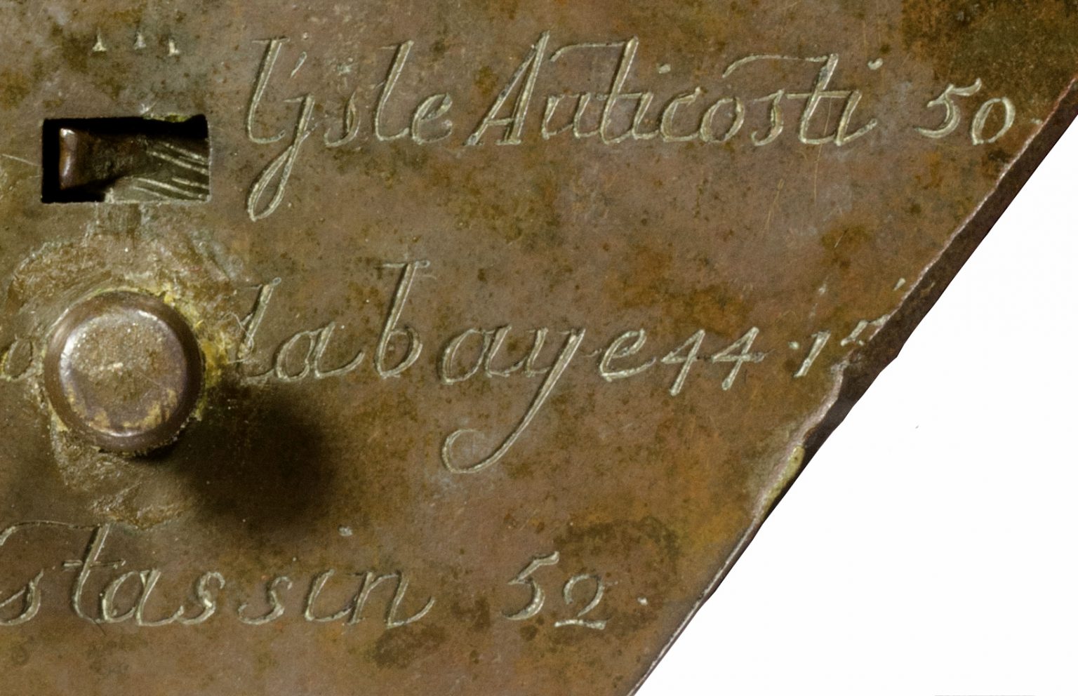 A detail view of the brass sundial showing a part of the engraving that reads “La Baye”