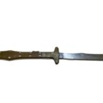 A folding knife with a wooden handle with brass scallop details at each end of the handle and diamond-shaped pins.