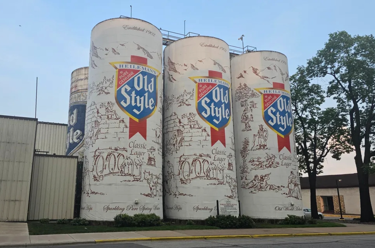 Six silos wrapped in plastic, designed to look like the Heileman's Old Style beer cans.