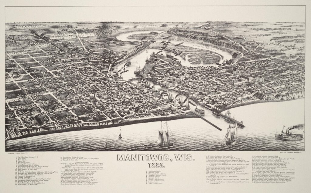 A black-and-white map of the City of Manitowoc from Lake Michigan. Many different types of boats are in the foreground, and the gridded city streets are arranged on either side of the winding Manitowoc River.
