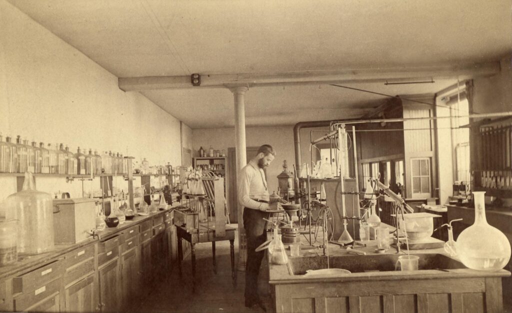 A man works in a chemistry laboratory.