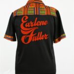 Back of Earlene Fuller's bowling shirt. It reads "Earlene Fuller" and features a kente cloth yoke.