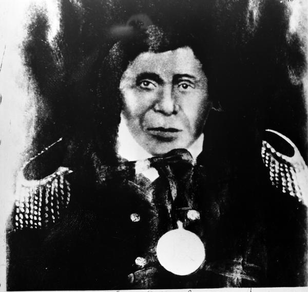 Black-and-white portrait of Chief Buffalo, an over-painted photograph.