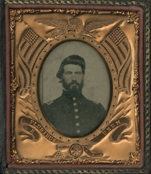 Framed tintype portrait of Doctor James T. Reeve in a copper oval frame with Americana motifs.