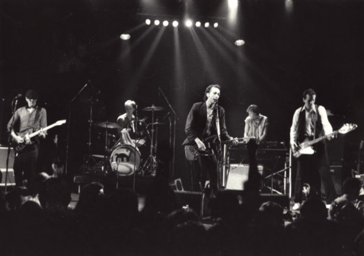Black-and-white photograph of the band Spooner performing at Headliners nightclub on University Avenue.