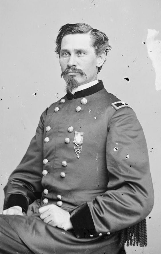 Half-length seated portrait of Orlando Poe in Civil War Union uniform.