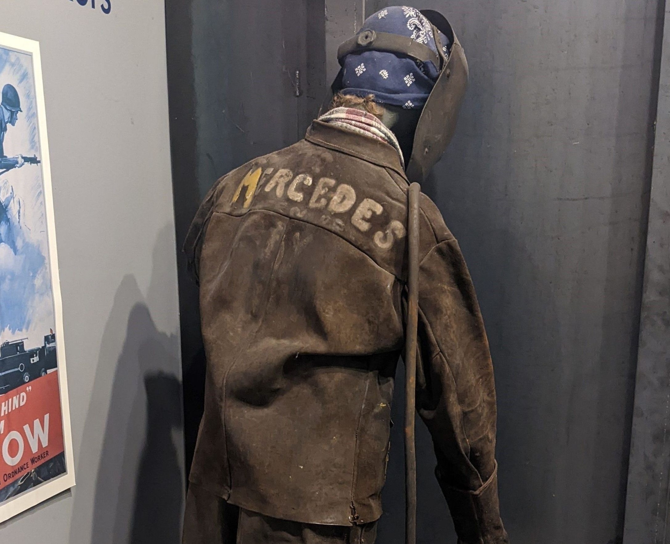 A welding uniform in a museum display.