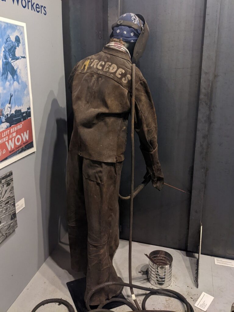 A welding uniform in a museum display.