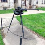 The Ingersoll-Seargent Pneumatic Rock Drill, installed in front of Roundtree Hall in Platteville. It looks like a jackhammer, turned on its side, and mounted to a tripod.