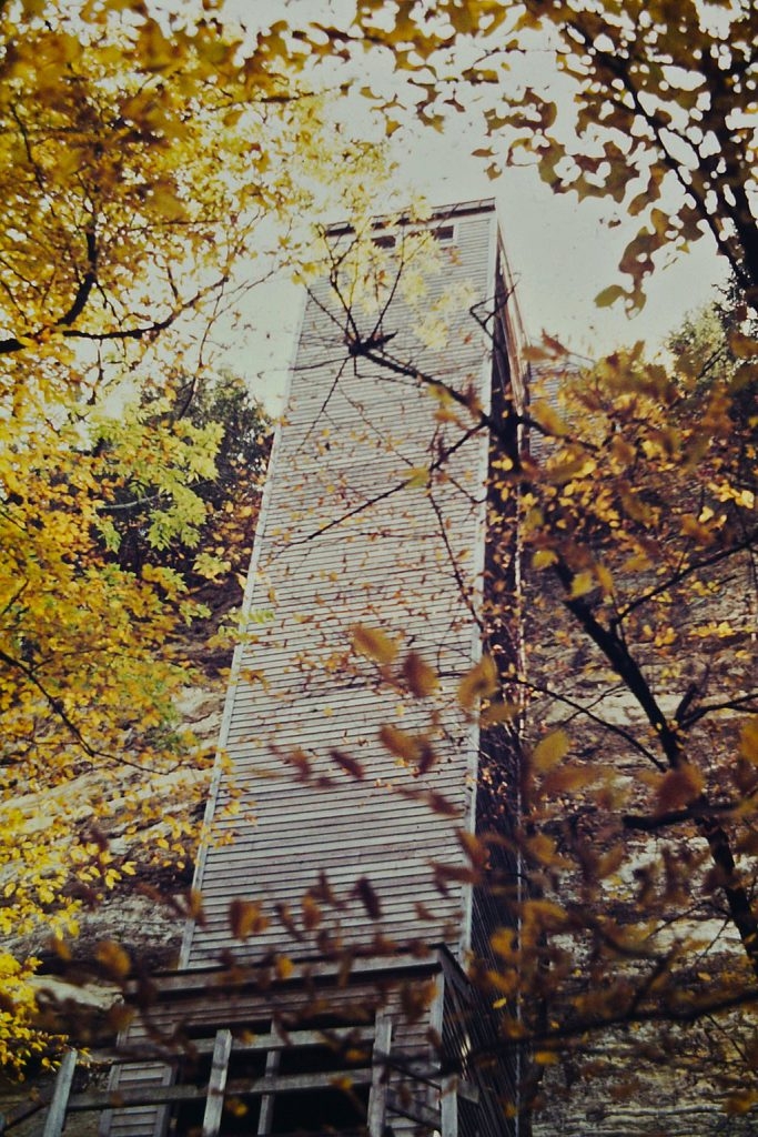 A wooden tower used to make lead shot, photographed from the ground.