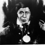 Black-and-white portrait of Chief Buffalo, an over-painted photograph.