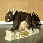 Miniature porcelain decanter in the form of a hodag.