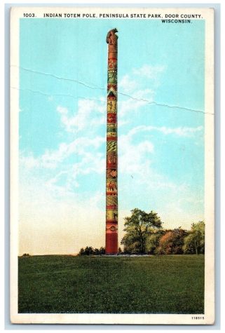 A color postcard of the totem pole at Peninsula State Park.