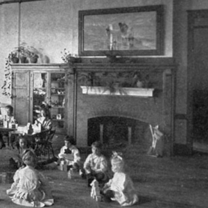 an image of children playing before a fireplace