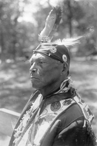 Quarter-length photo portrait of Potawatomi Chief Simon Onanguisse Kahquados.