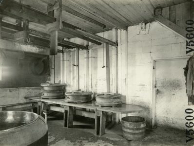 Image of vats in the interior of a cheese factory