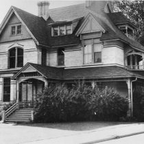 Front view of historic house in the summertime c. 1974. Photo courtesy of the Wisconsin Historical Society, ID# 28719.